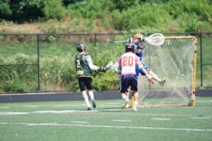 Local lacrosse teams use rivalry game to advocate for mental health awareness